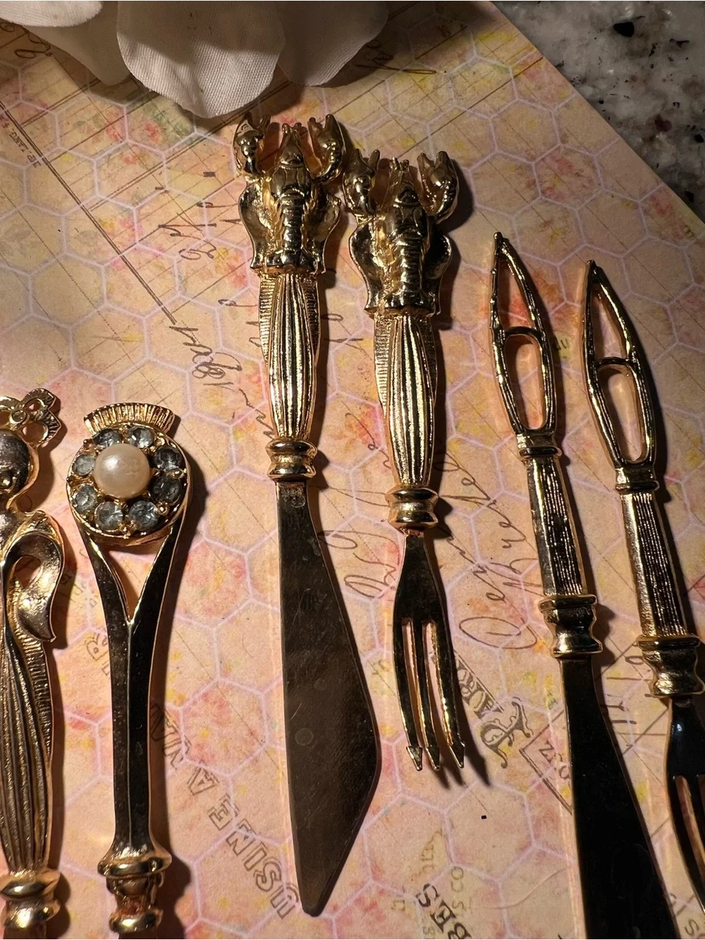 Vintage Gold-Tone Decorative Appetizer Knives and Forks Set no damage detected